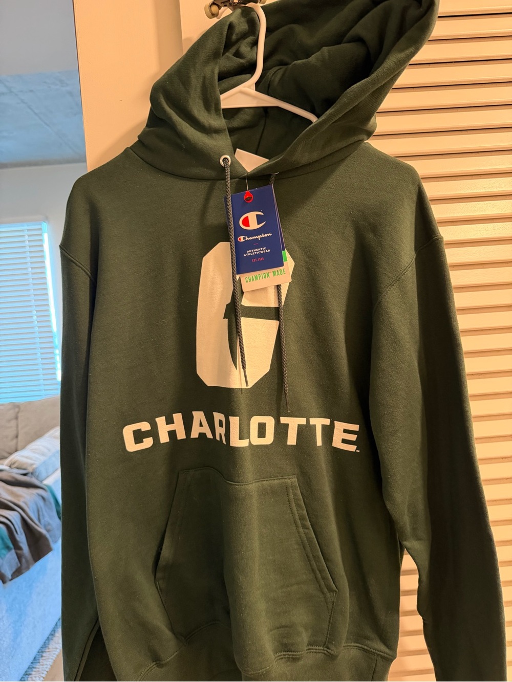 Men's Hoodie with Drawstrings - Likely Lightweight Jacket/Performance